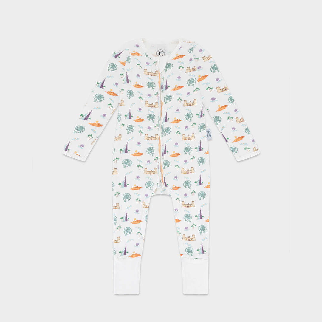 Baby onesie with a colorful animal pattern on a white background
