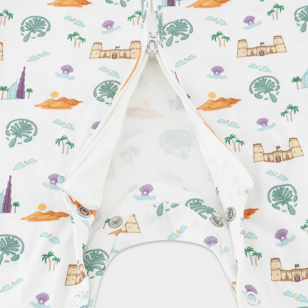 Baby bouncer with colorful travel-themed pattern on a white background - UAE_Convertible_Footies_Sleepsuit_6-9_months_9-12_months_12-18_months inside zipper